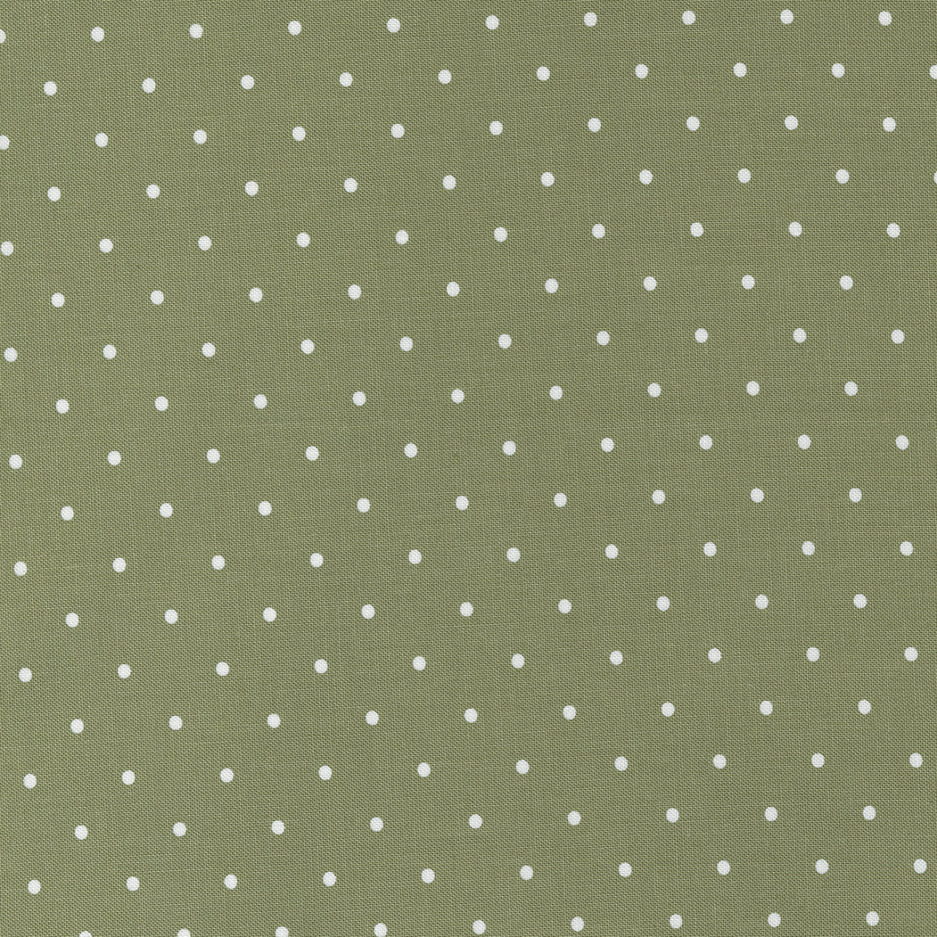 Cotton quilting fabric pattern called 'Merry Dot in Pine'. Part of the 'Christmas Eve' fabric collection. Designed by Lella Boutique for fabric company Moda Fabrics. SKU: 5187 15. 44-45 inch width.