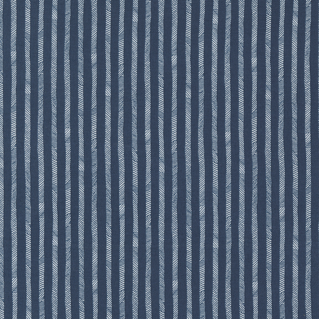 Cotton quilting fabric pattern called 'Stripes in Navy'. Part of the 'Sweetwater Road' fabric collection. Designed by Stateside for fabric company Moda Fabrics. SKU: 55617 23. 44-45 inch width.