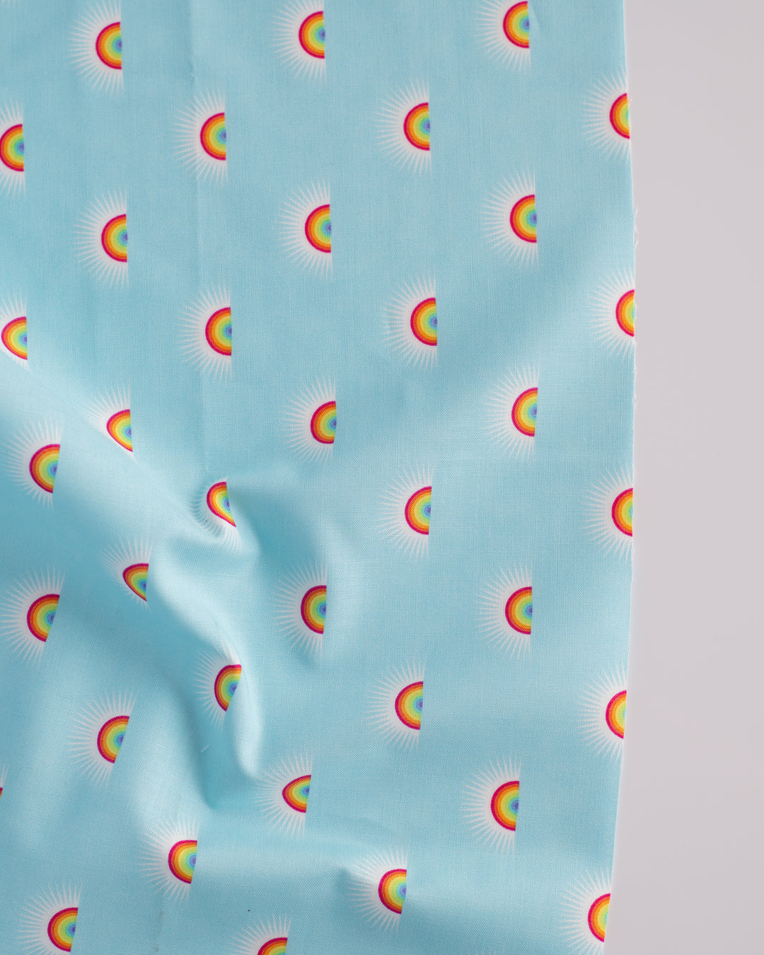 Cotton quilting fabric pattern called 'Sundaze in Cloud'. Part of the 'Daydreamer' fabric collection. Designed by Tula Pink for fabric company Free Spirit Fabrics. SKU: PWTP176.CLOUD. 44-45 inch width.