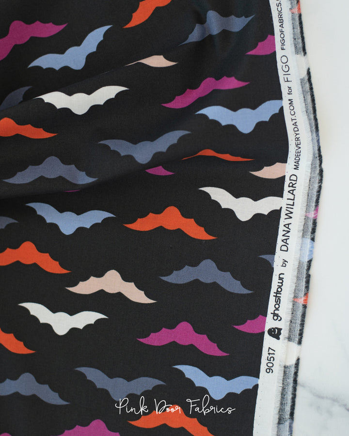 Cotton quilting fabric pattern called 'Bats in Black'. Part of the 'GhostTown' fabric collection. Designed by Dana Willard for fabric company Figo Fabrics. SKU: 90517-99. 44-45 inch width.