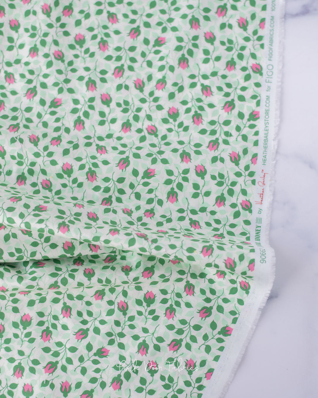 Cotton quilting fabric pattern called 'Rosebud in Mint'. Part of the 'Local Honey' fabric collection. Designed by Heather Bailey for fabric company Figo Fabrics. SKU: 90662-60. 44-45 inch width.