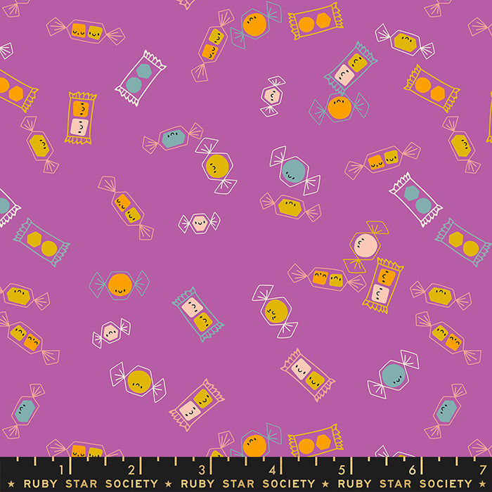 Cotton quilting fabric pattern called 'Tossed Candy in Witchy'. Part of the 'Tiny Frights' fabric collection. Designed by Ruby Star Society for fabric company Moda Fabrics. SKU: RS5124 13. 44-45 inch width.